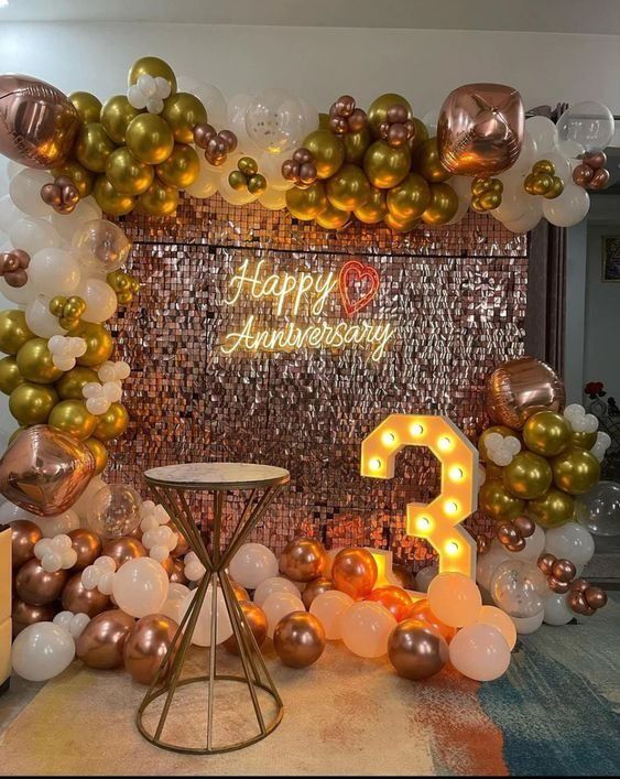 Romantic anniversary decoration setup at home with flowers and lights