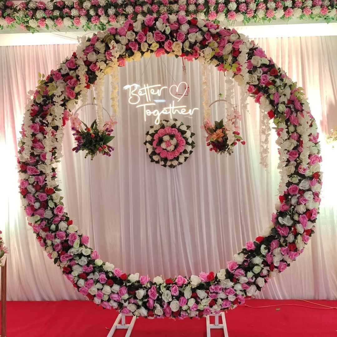 Ring ceremony decoration backdrop with flowers and draping